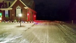 Driveway freshly plowed in South Lyon, Michigan